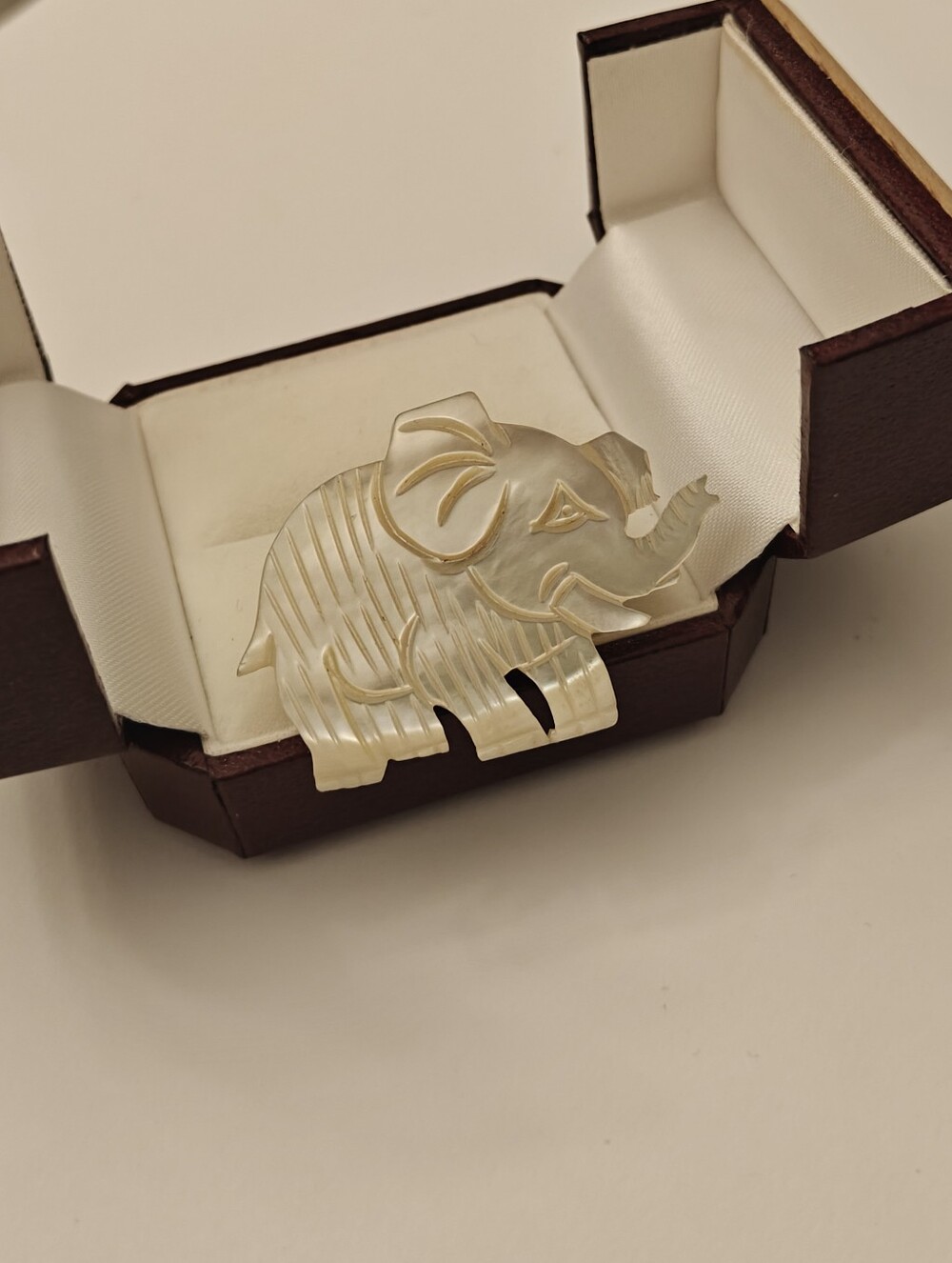 Vintage hand carved mother of pearl elephant pin